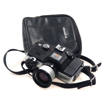 MINOLTA 110 SLR ZOOM ROKKOR 25-50mm CAMERA CASED NICE