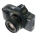 Canon T70 SLR retro film camera FD 50mm 1.8 lens strap and body cap